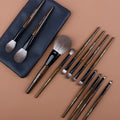 12 makeup brushes with wooden handles in a grey PU storage case, including powder foundation brush