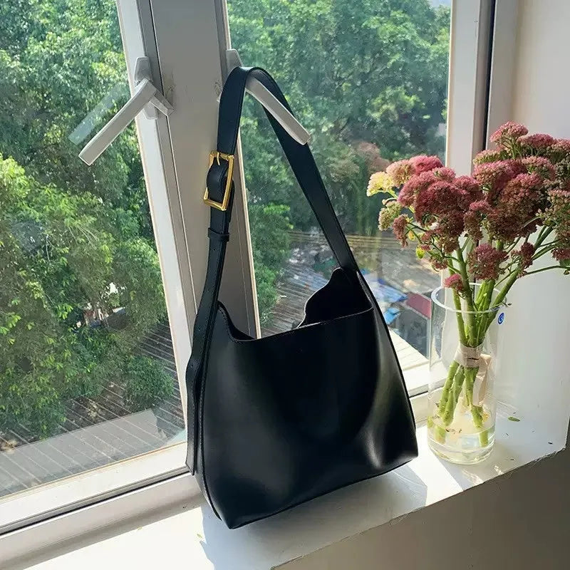 Women's soft PU shoulder bag with swing threads in 28x32x12cm size