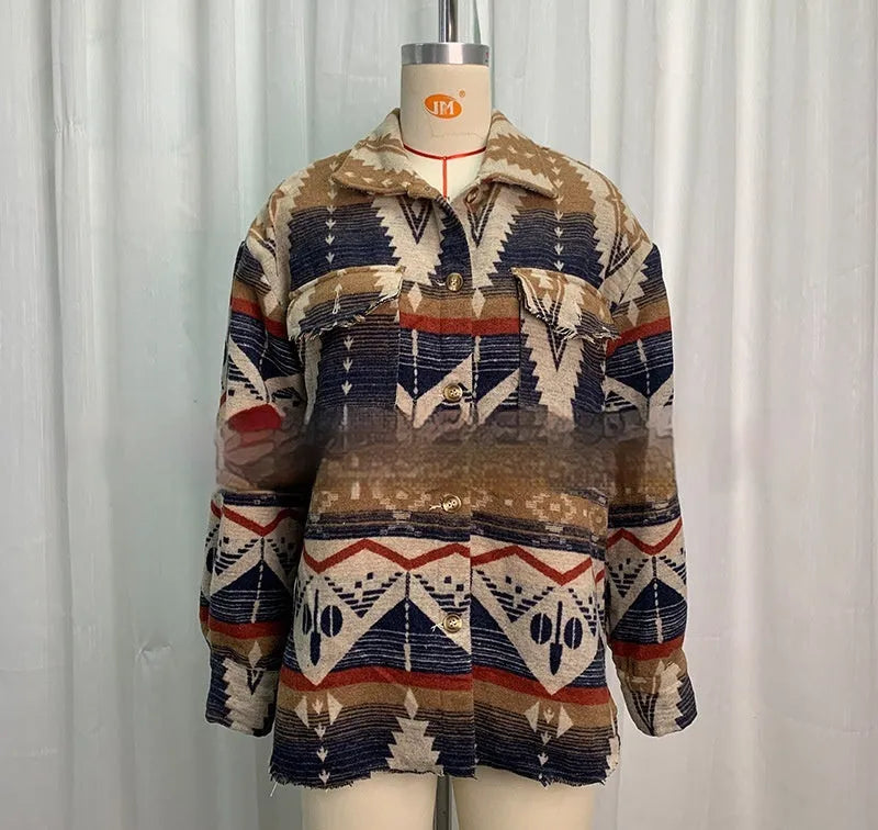 Women's loose-fit retro coat with blue Aztec print and long sleeves.