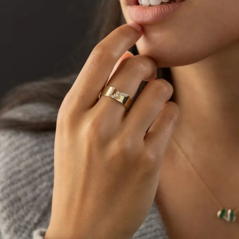 Women's gold electroplated copper ring with shining zircon stone in multiple sizes