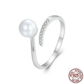Adjustable S925 sterling silver ring featuring a natural shell pearl on a polished band.