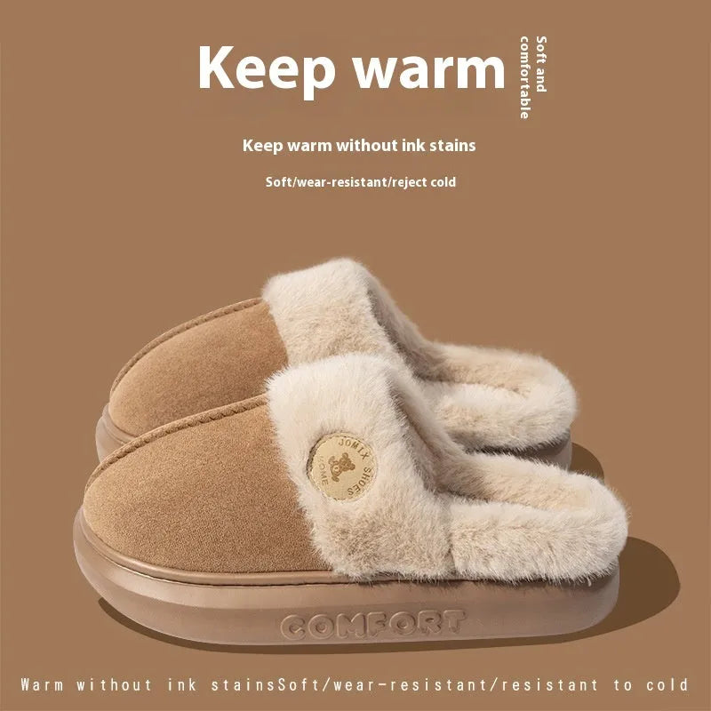A pair of plush fleece slippers with a thick PVC sole and car stitching detail, shown in a choice of colours.