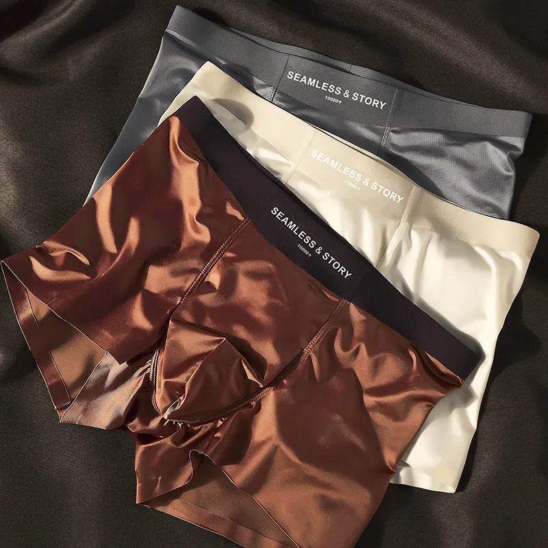 Men's ice silk underwear set in a solid colour showing mid-waist traceless design.