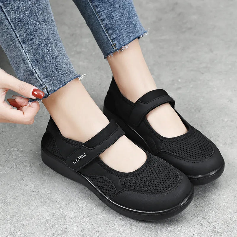 Women's grey mesh casual shoes with velcro fastening and round toe design