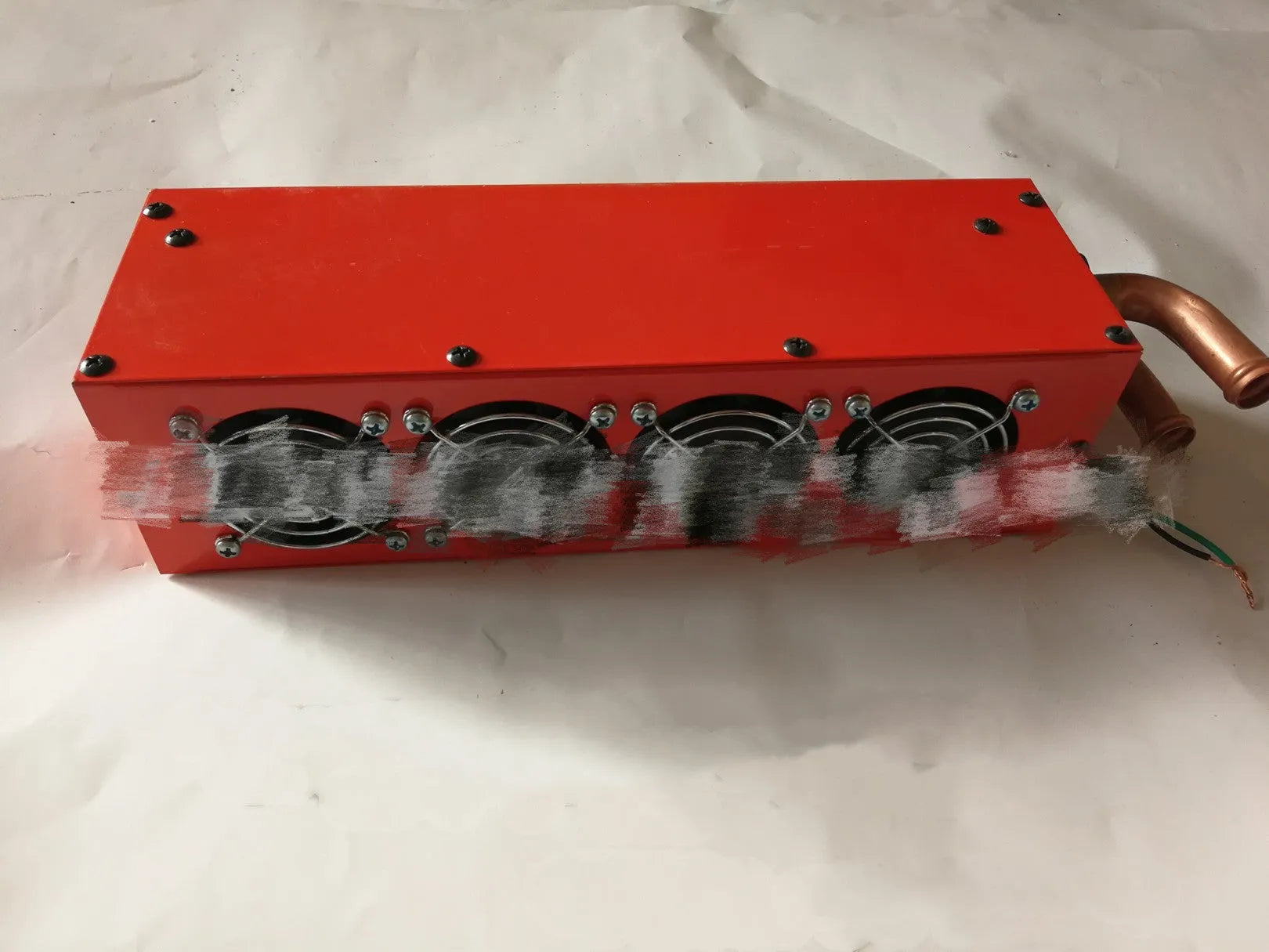 Metal car heater with long copper pipe for 12V or 24V vehicle installation.