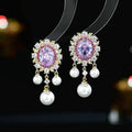 Geometric oval pearl tassel earrings with zircon detailing in light purple colour