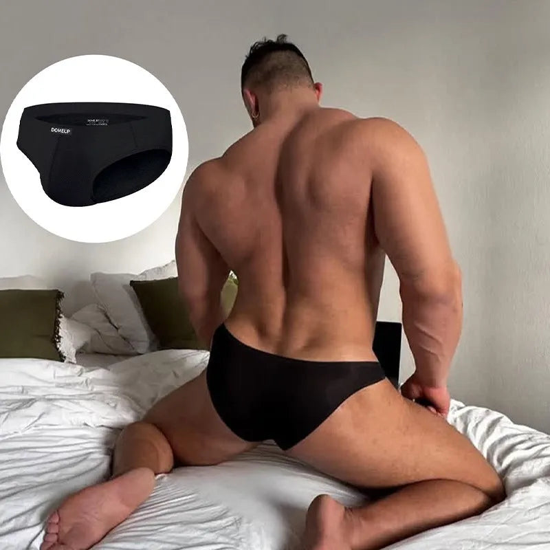 Men's seamless polyester briefs in white, black and pink with low waist design