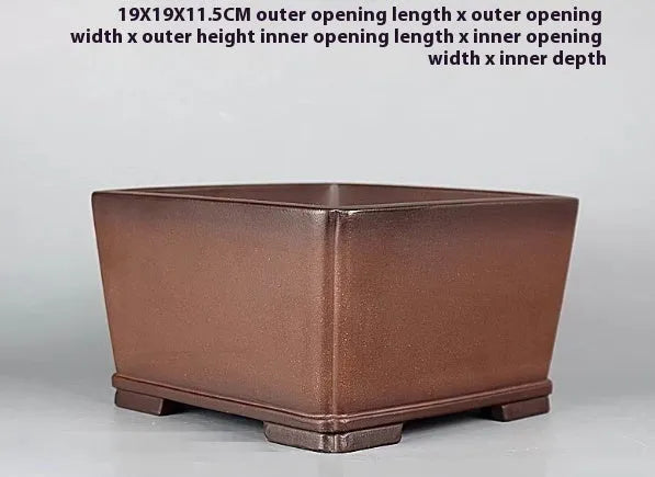 Brown handmade antique purple clay flower pot for indoor plants