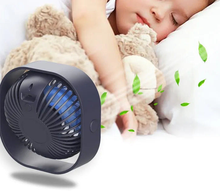 USB desk fan in blue colour with 360-degree rotation head and rotary switch, showing modern simple design.