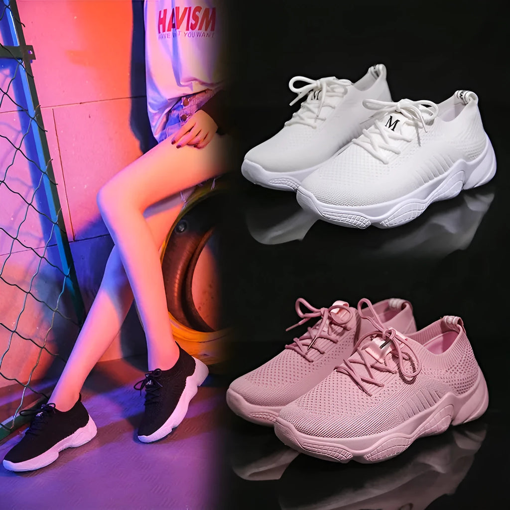 White women's thick-soled flying woven sports shoes with a front strap and rubber sole.