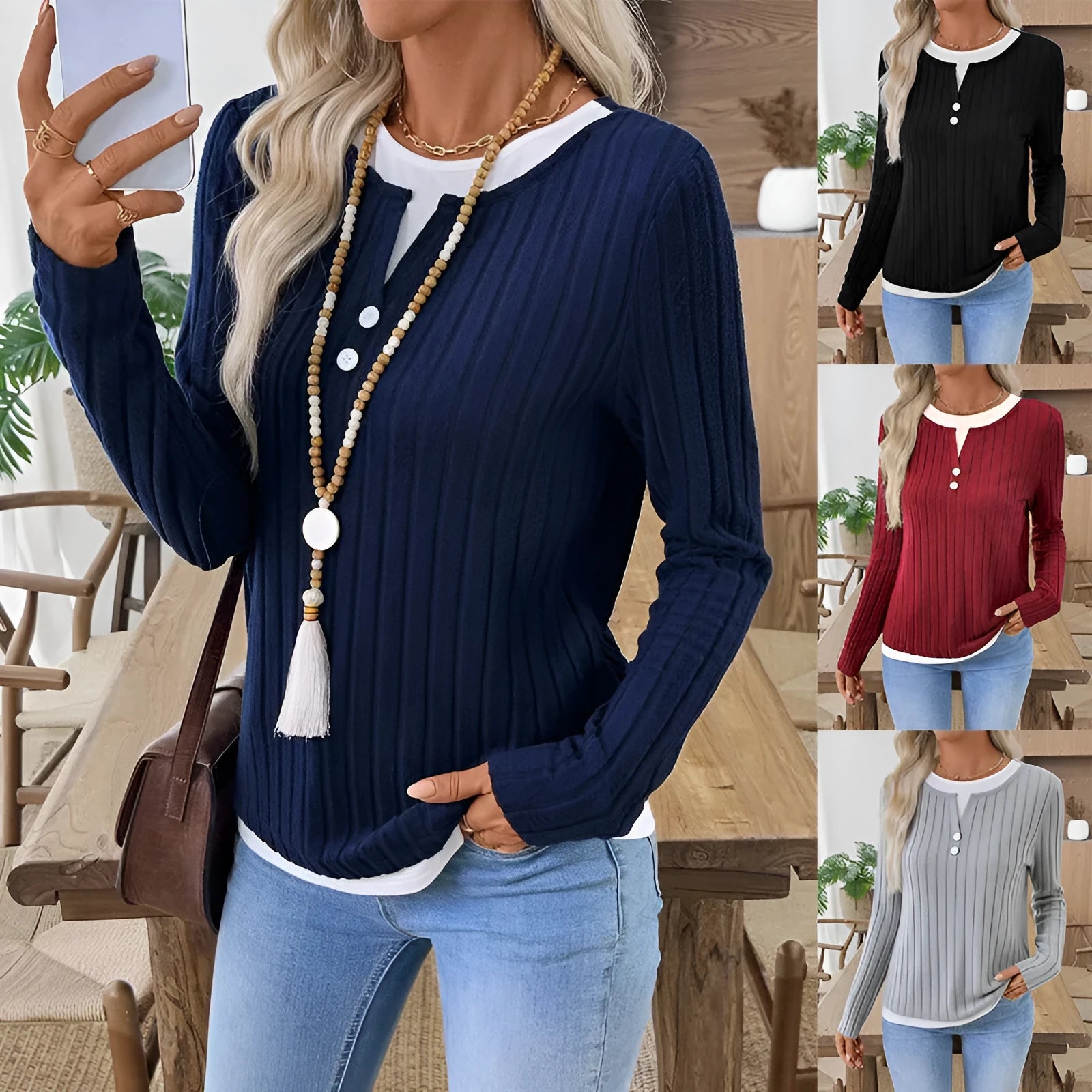 Women's grey fake two-piece striped pullover sweater with round neck and button detail.
