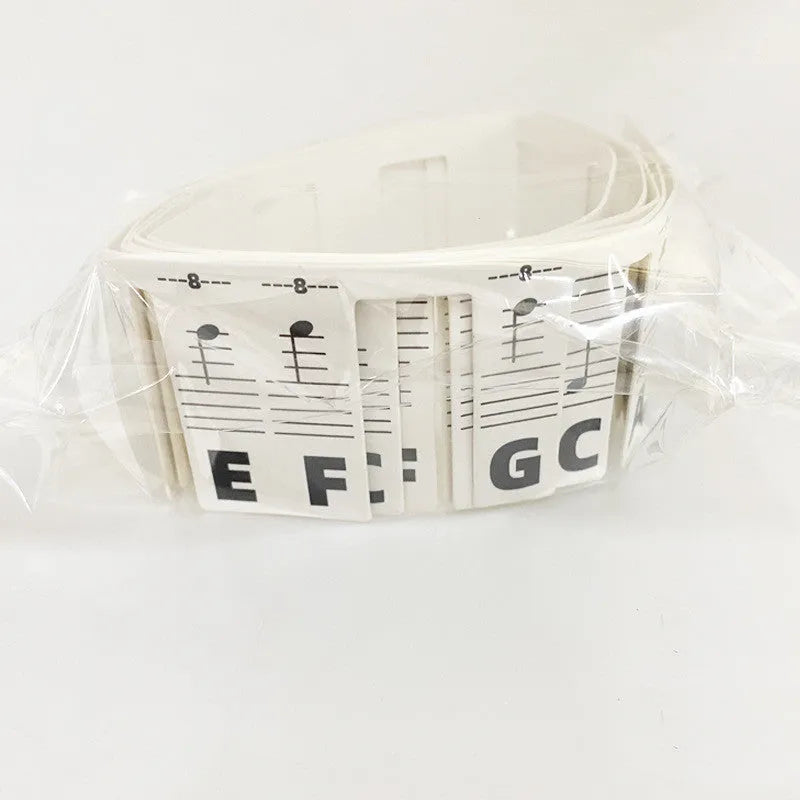 White cardboard piano keyboard stickers for 88 keys with colour note bars and black note labels