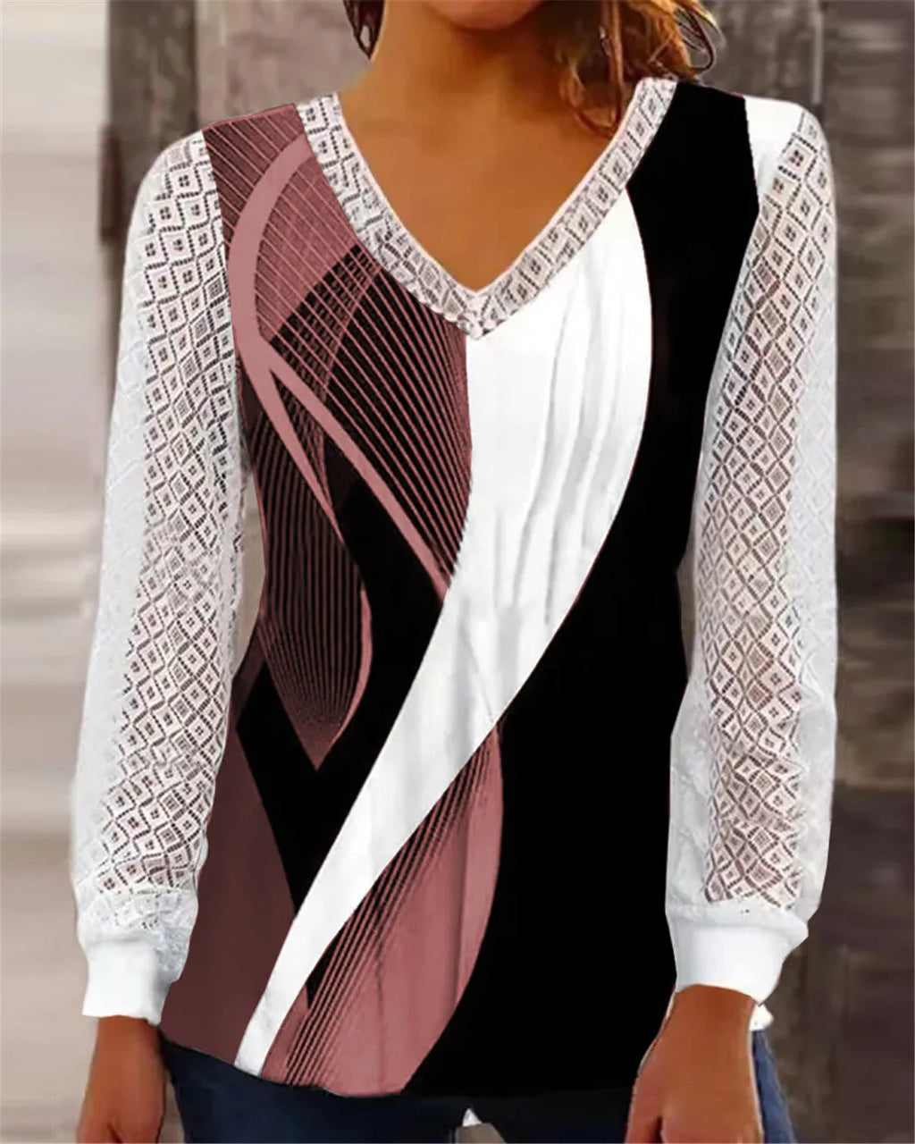 Women's purple V-neck loose top with long sleeves and a hollow-out lace print pattern.