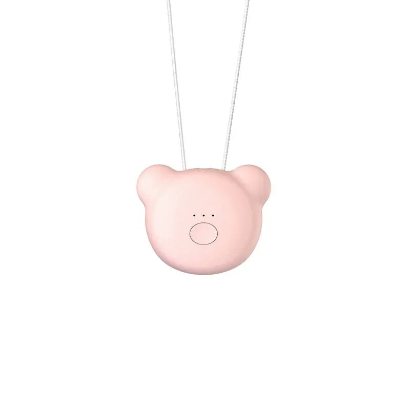 Mini USB portable air purifier necklace in pink, showing compact design with a wearable collar.