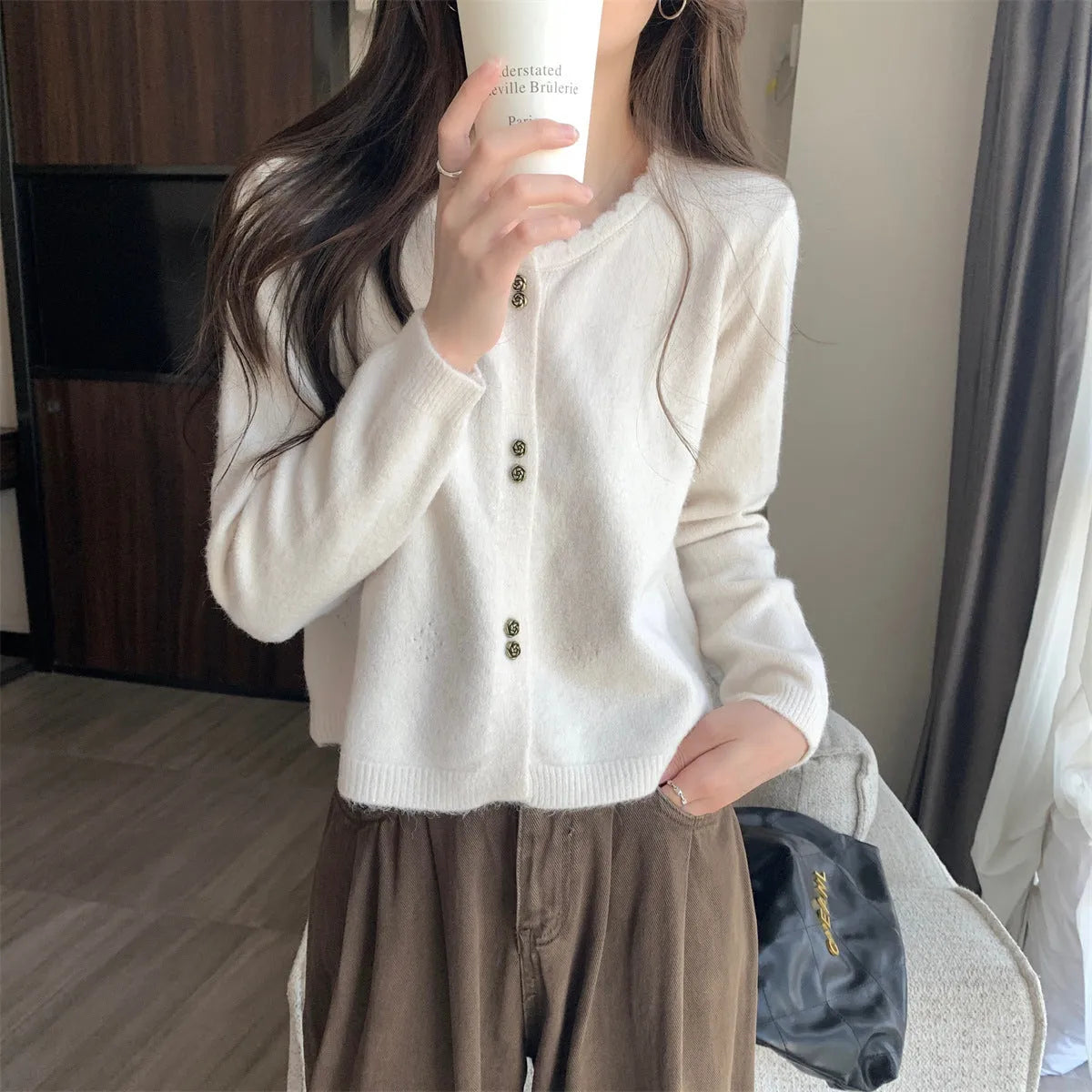 Women's long-sleeved acrylic cardigan coat in milky white, red, pink, light purple, or black.