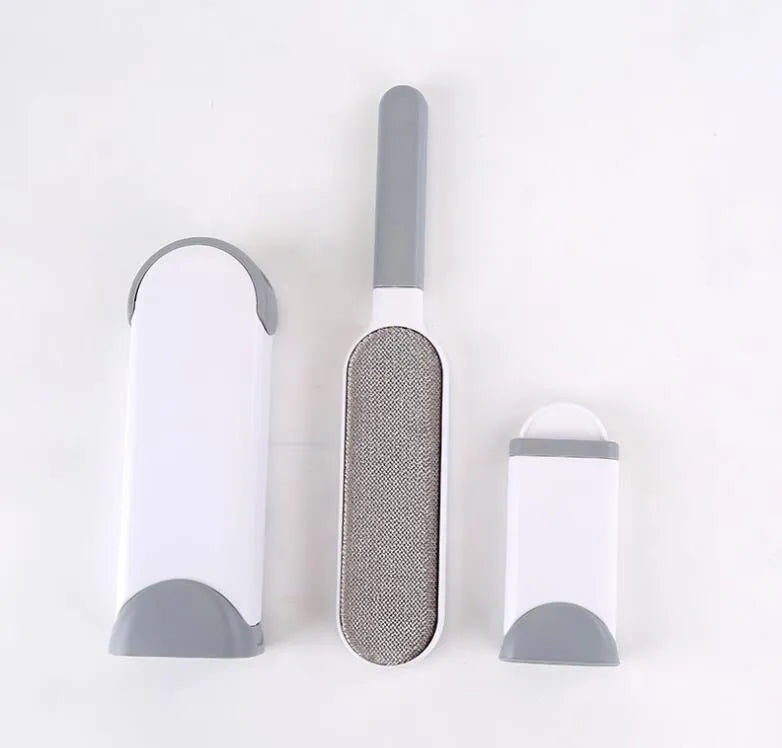 Blue reusable pet hair removal comb with a double-sided sticky brush and self-cleaning base.