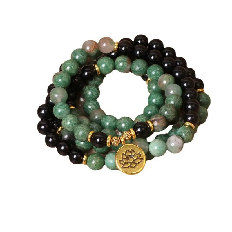 Green and black elastic beaded long bracelet with alloy components