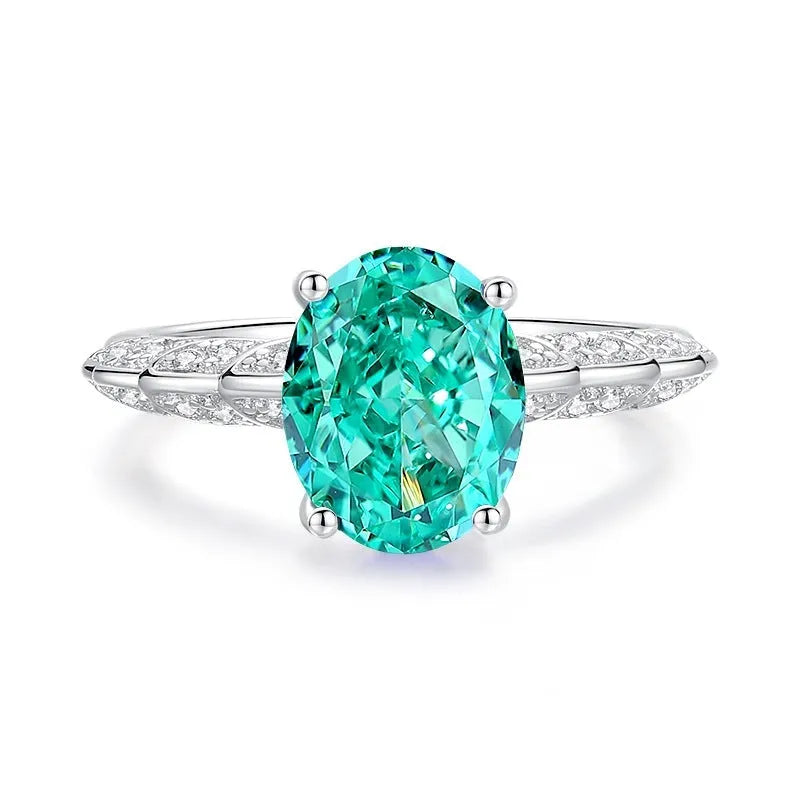 S925 silver emerald ring for women with inlaid high carbon diamonds in a geometric design on a white background.