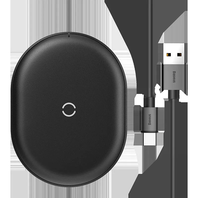 Baseus black wireless charging pad with phone positioned on charging surface