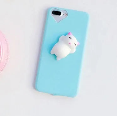 Soft silicone TPU iPhone case with a raised 3D cartoon cat design, shown in various colours.