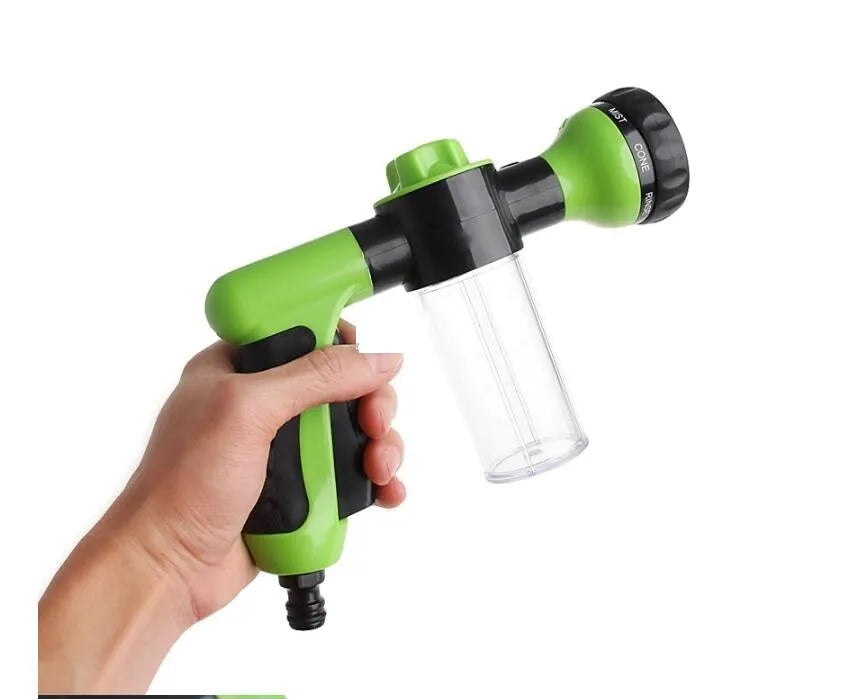 Green high-pressure foam spray water gun with adjustable nozzle for car and garden cleaning.