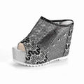 Korean platform flip flops with hollowed-out heel, chunky waterproof sole, and mesh upper in black colour