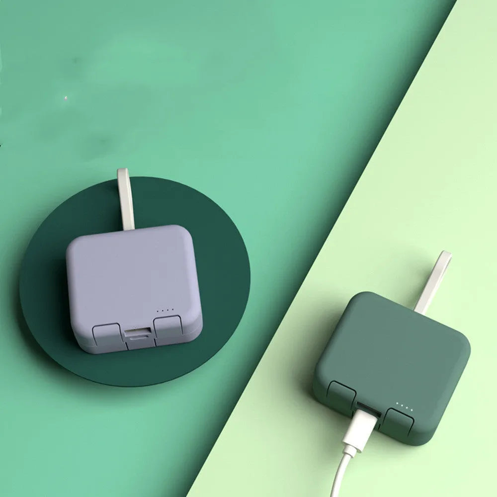 Handbag back clip power bank in blue showing clip, phone stand function, and type-c/USB-A charging ports
