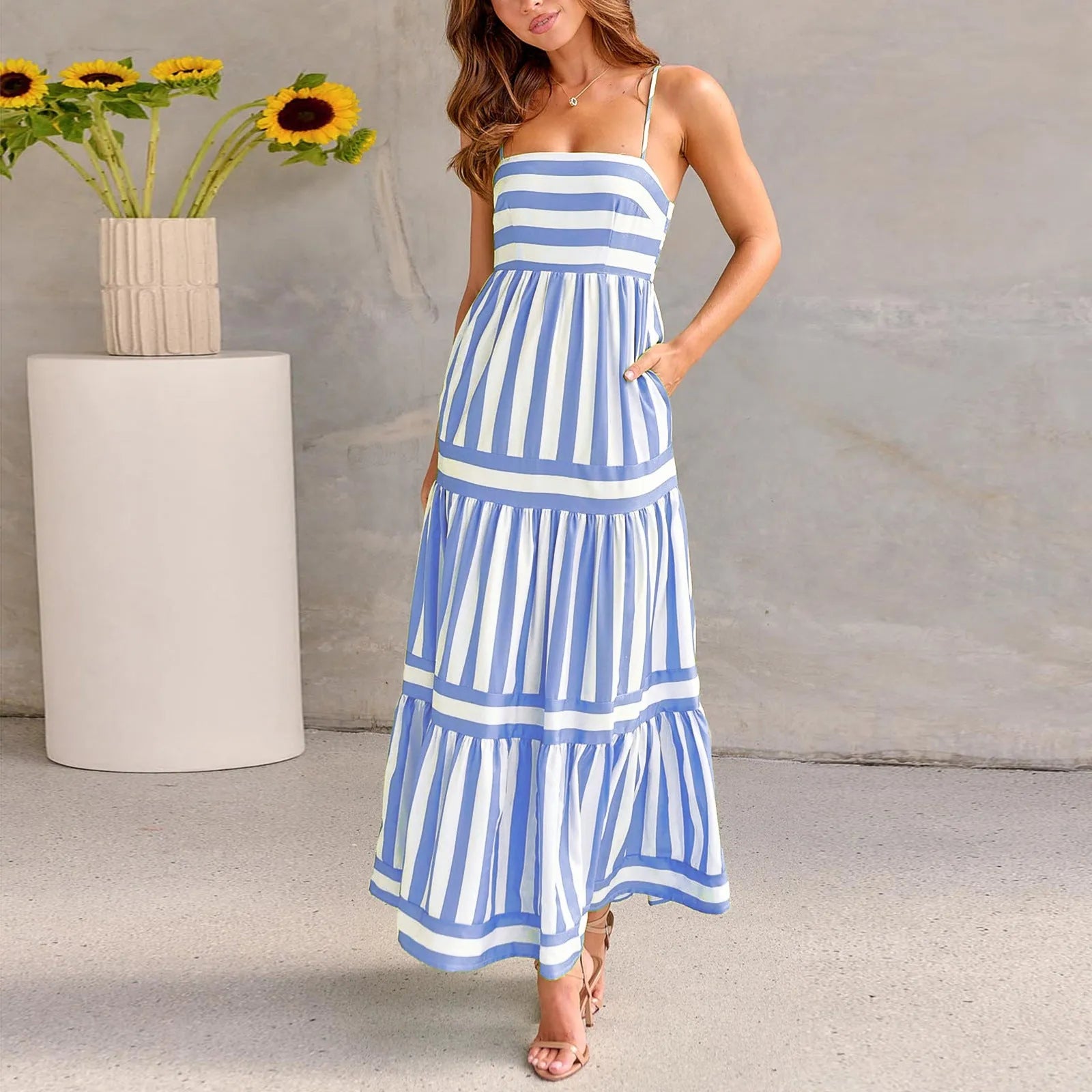 Women's striped long summer dress with suspenders, a square neck, backless design, and side pockets.