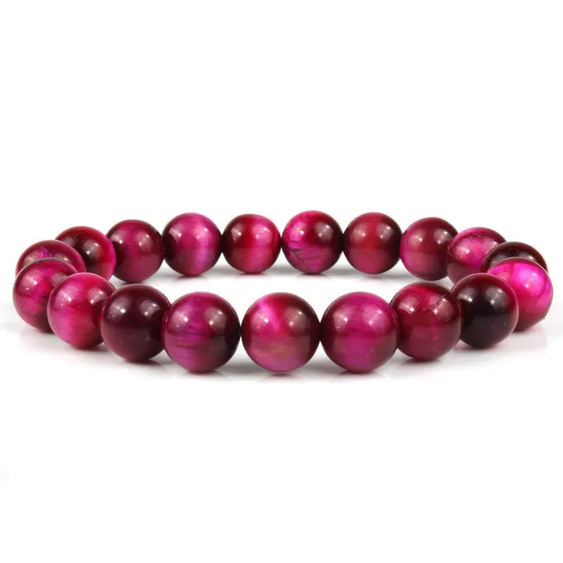 Natural tigereye crystal bracelet with geometric round beads showing colour and size options.
