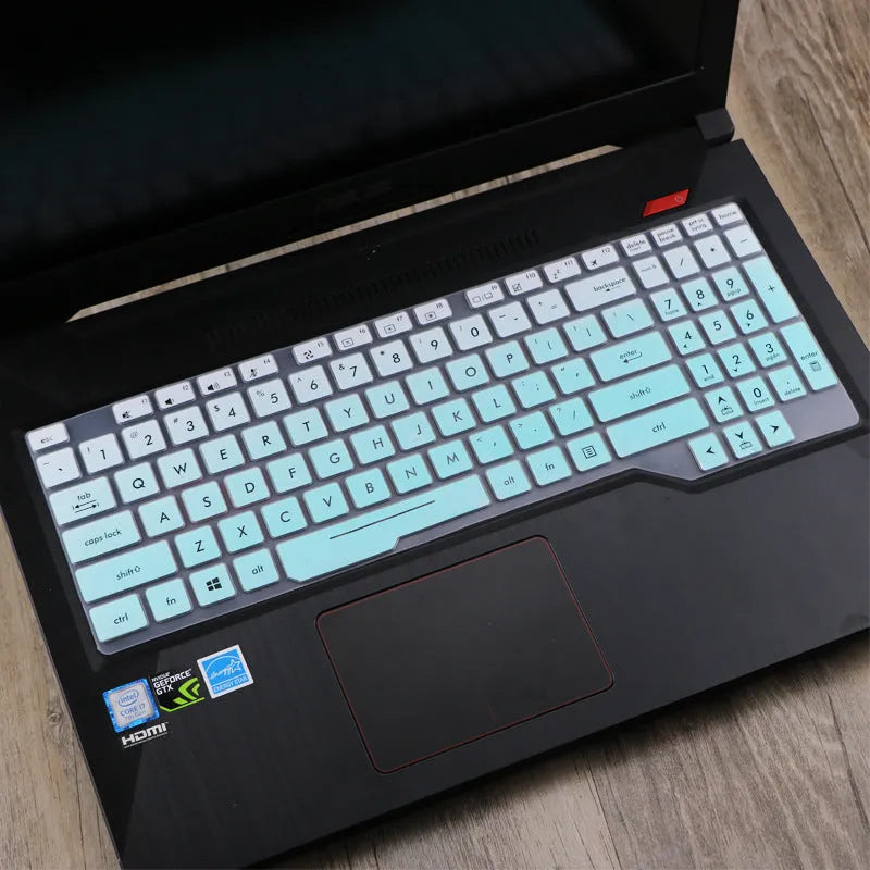 ASUS Flight laptop keyboard protective film cover in multiple colour options on a laptop.