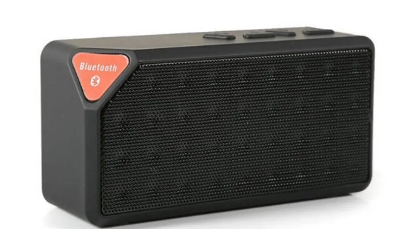 Cannon X3 cube-shaped wireless Bluetooth speaker shown in black, blue, green, red, and yellow colour options.