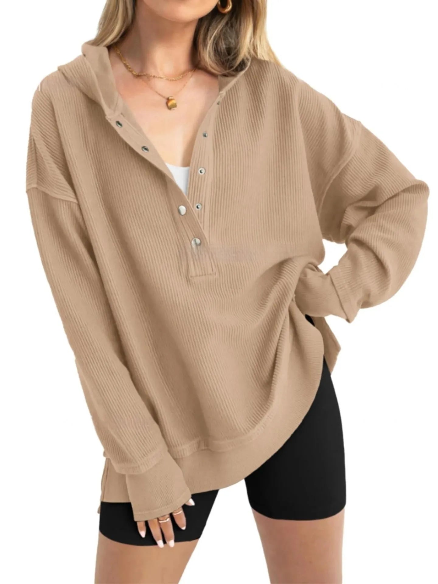 Women's loose fit raglan sleeve sweater in peacock green, shown on a model.