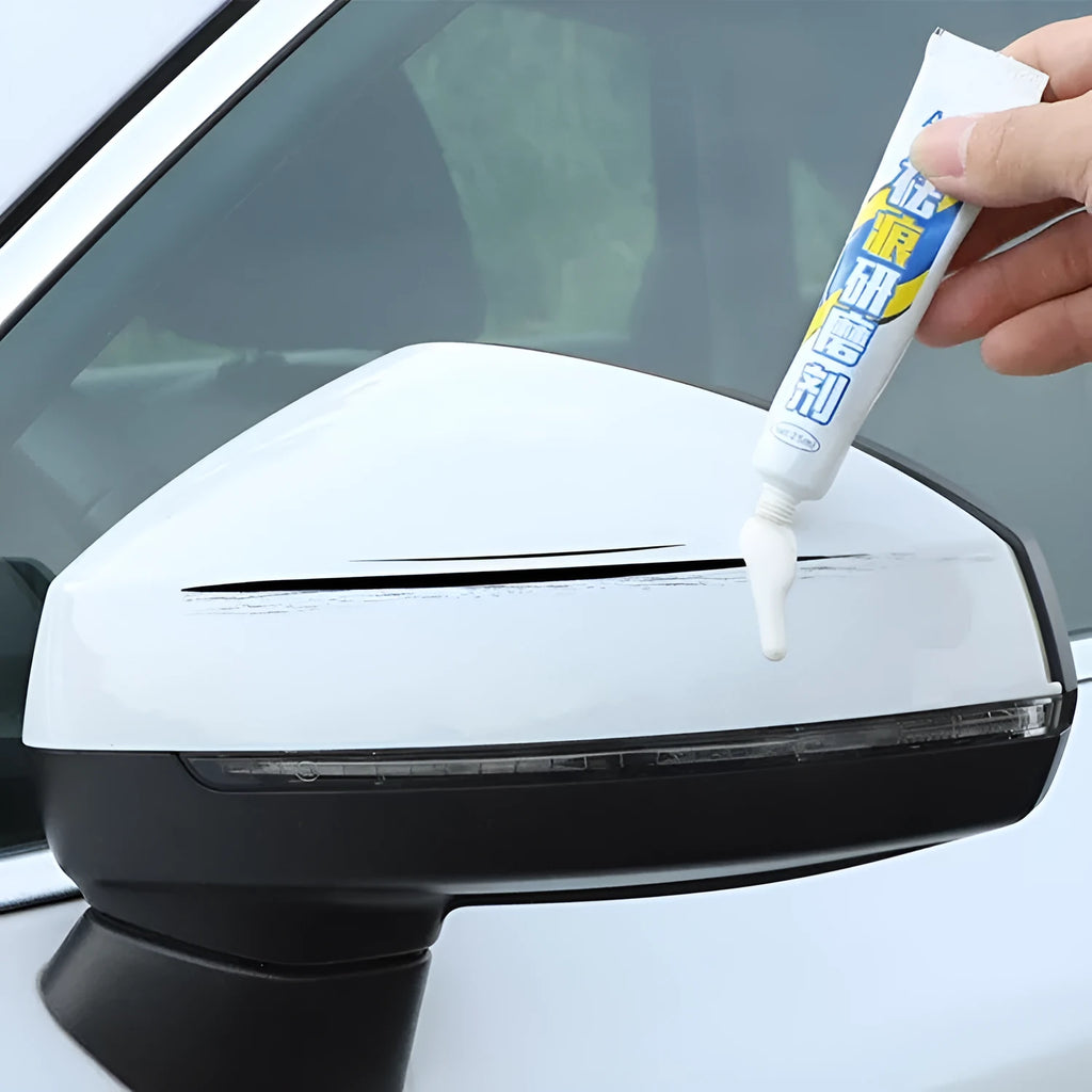 Automotive scratch repair kit with paint pen, wax pen, sponge, and sandpaper