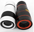 12X magnification black phone telescope with adjustable clip attached to a smartphone