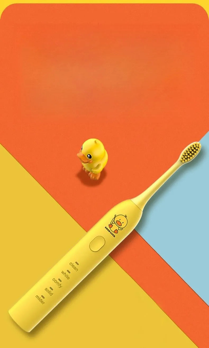 USB rechargeable electric toothbrush in yellow with small duck design and soft bristle head