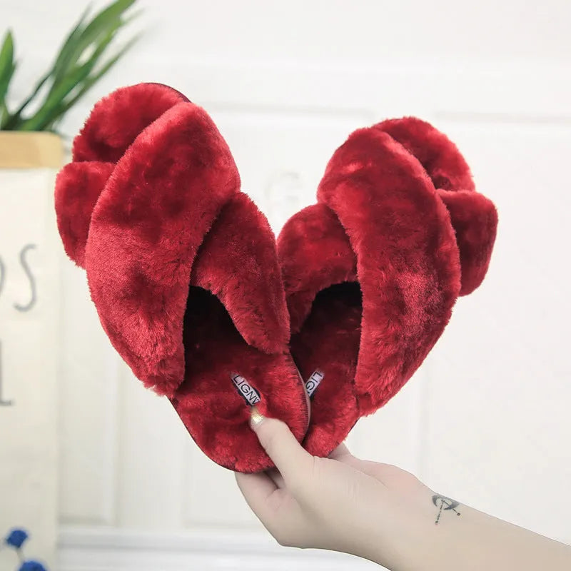 Cross open-toe fur slippers in various colours on a non-slip patterned rubber sole.