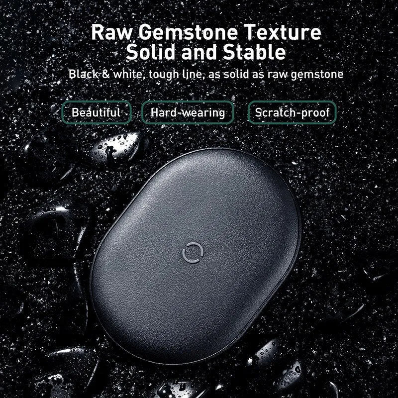 Baseus black wireless charging pad with phone positioned on charging surface