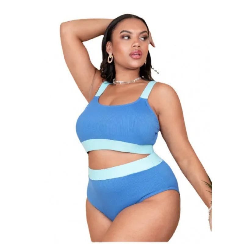 Women's high waisted polyester bikini swimsuit with split sides and intricate stitching details in solid colour