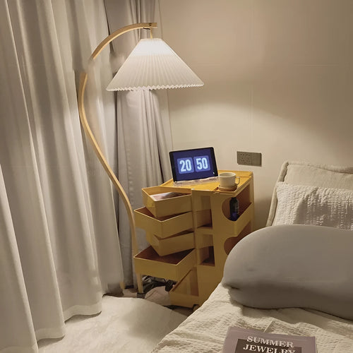 Retro vertical table lamp with three-colour variable light on bedside table