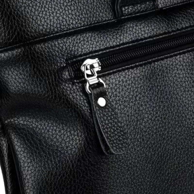 Black and brown men's PU leather messenger bag with splicing design on strap.