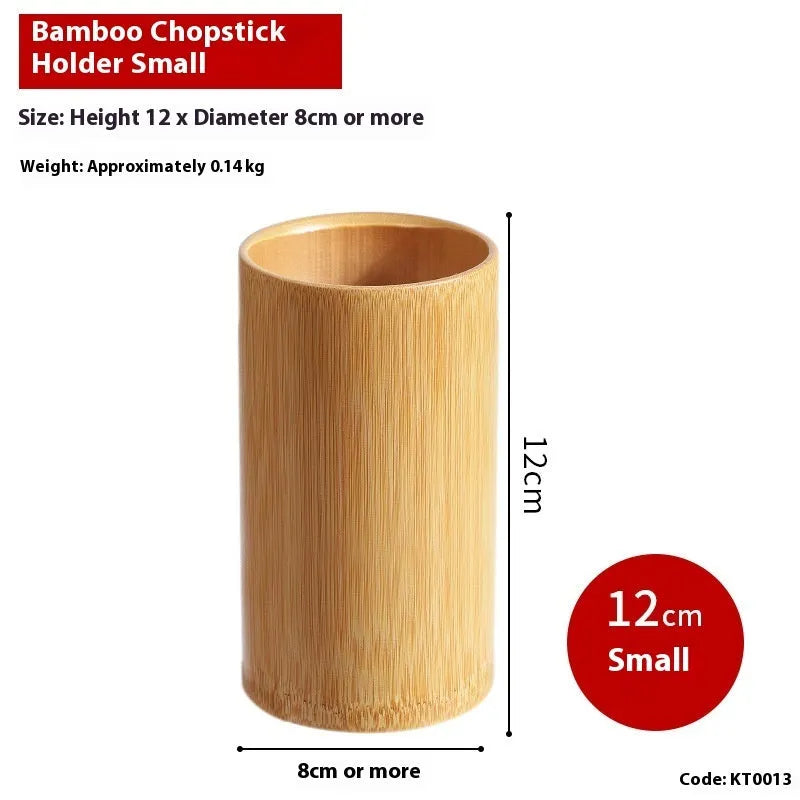 Wild bamboo chopsticks holder tube on a kitchen countertop.