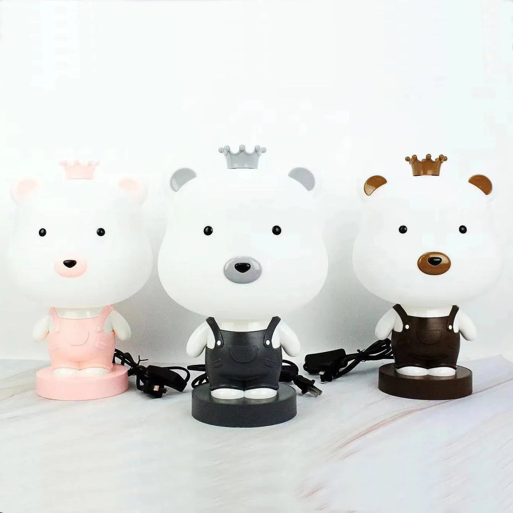 Cartoon animal table lamp in bear, rabbit, tiger, or cattle design with LED light and plastic shade.