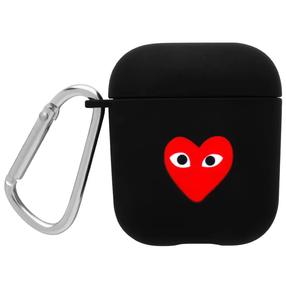 Black and pink AirPods case covers with floral and smiley face decorative patterns