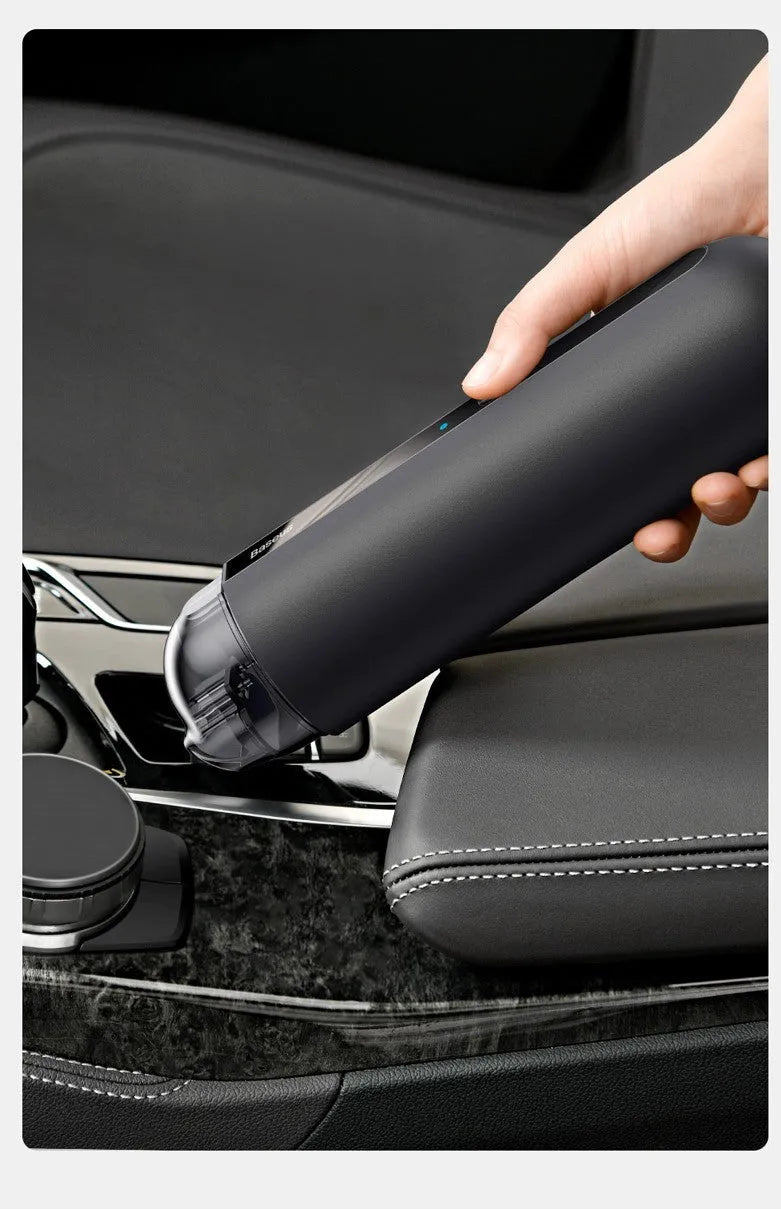 Baseus handheld car vacuum cleaner in black, white, or green, shown with blowing hose attachment.