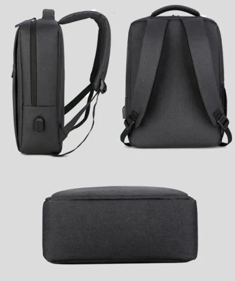 Black waterproof rechargeable backpack for a laptop, showing shoulder straps and a USB charging port.