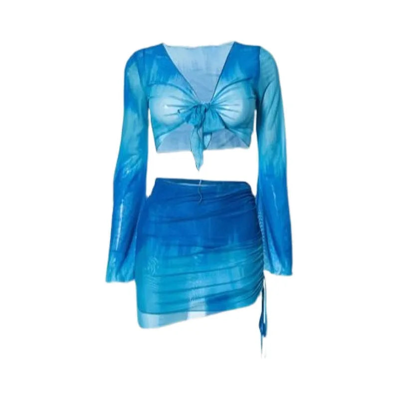 Women's blue four-piece bikini set with high-waist briefs, backless top, and coordinating skirt