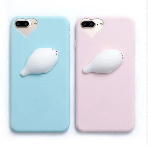 Soft silicone TPU iPhone case with a raised 3D cartoon cat design, shown in various colours.