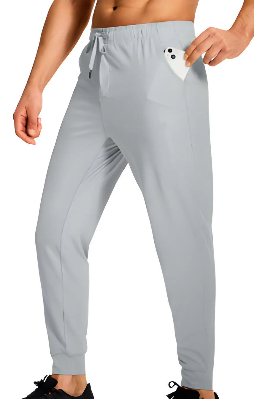 Men's loose-fit straight-leg casual trousers in a solid colour, made from polyester fabric.