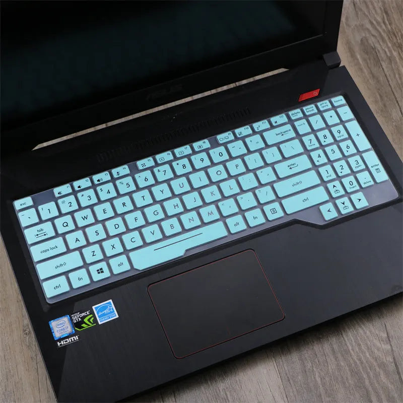ASUS Flight laptop keyboard protective film cover in multiple colour options on a laptop.