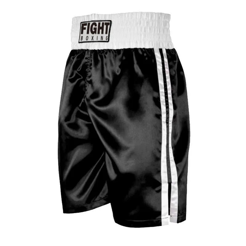 Two-tone boxing shorts for kickboxing in a black and white colour combination with a wide waistband.